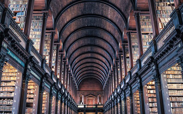 Interior of old library with multiple levels of book stacks