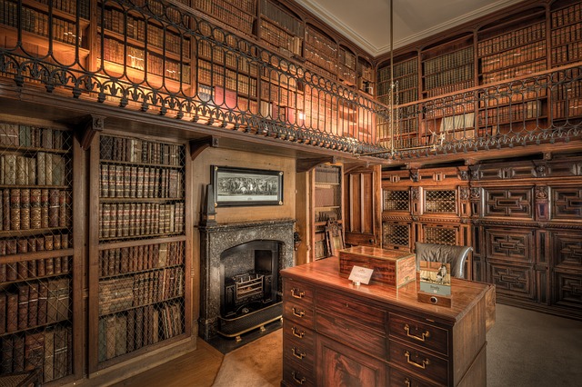 a writing desk in a personal library