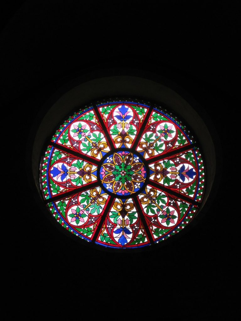 a rose shaped stained glass window